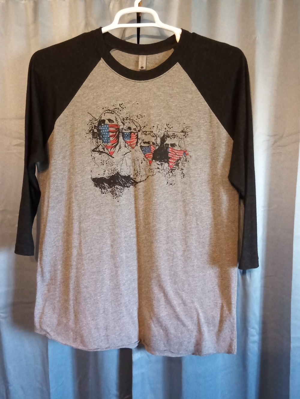 Next Level Apparel Gray Body Black Raglan Sleeve Graphic Tee with Flag Accent